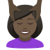 💆🏿‍♀️ woman getting massage: dark skin tone display on JoyPixels